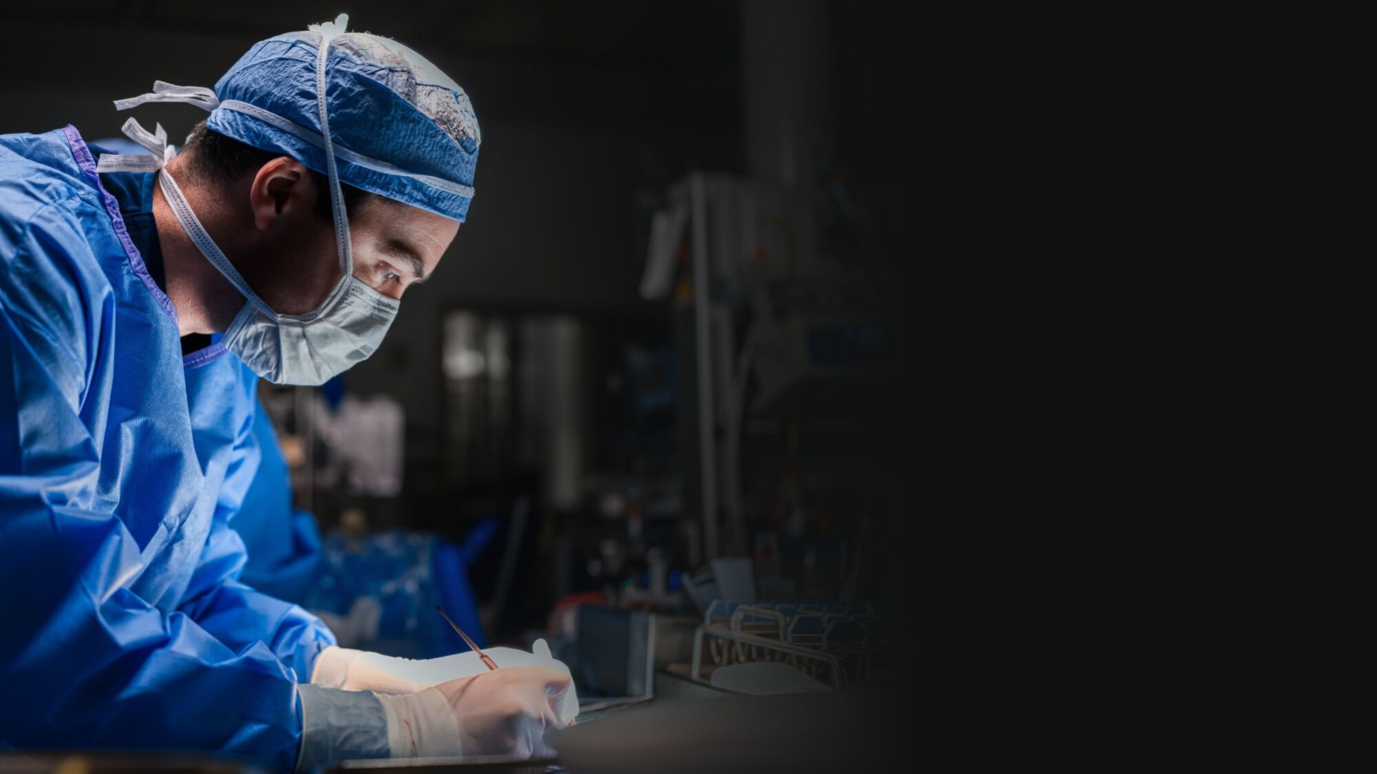 head and neck surgeon griffin santarelli in operating room