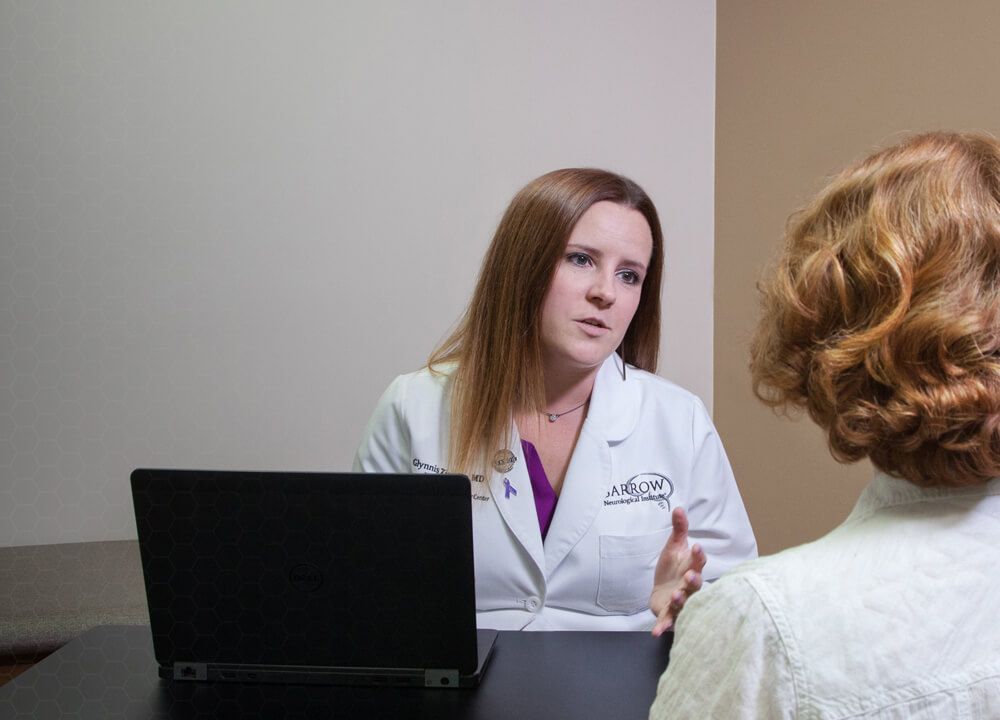 Barrow doctor talking to patient